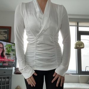 Soft white blouse with flattering ruching on bodice
